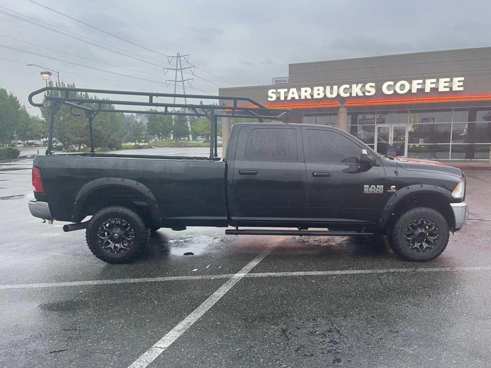 2015 Black Forest Green Pearlcoat /Gray RAM 2500 TRADESMAN CREW CAB LWB ST (3C6UR5HL2FG) with an 6.7L engine, Automatic transmission, located at 1505 S 356th St., Federal Way, WA, 98003, 47.282051, -122.314781 - This Ram 2500 Cummins TurboDiesel 4x4 has a beautiful Black Forest Green Pearlcoat exterior like you've never seen before - ONE OF A KIND! Gooseneck towing package with air suspension, custom grill, running boards, powder coated wood rack. Brand new Rotors and Pads Drilled and slotted, straight pipe - Photo #5