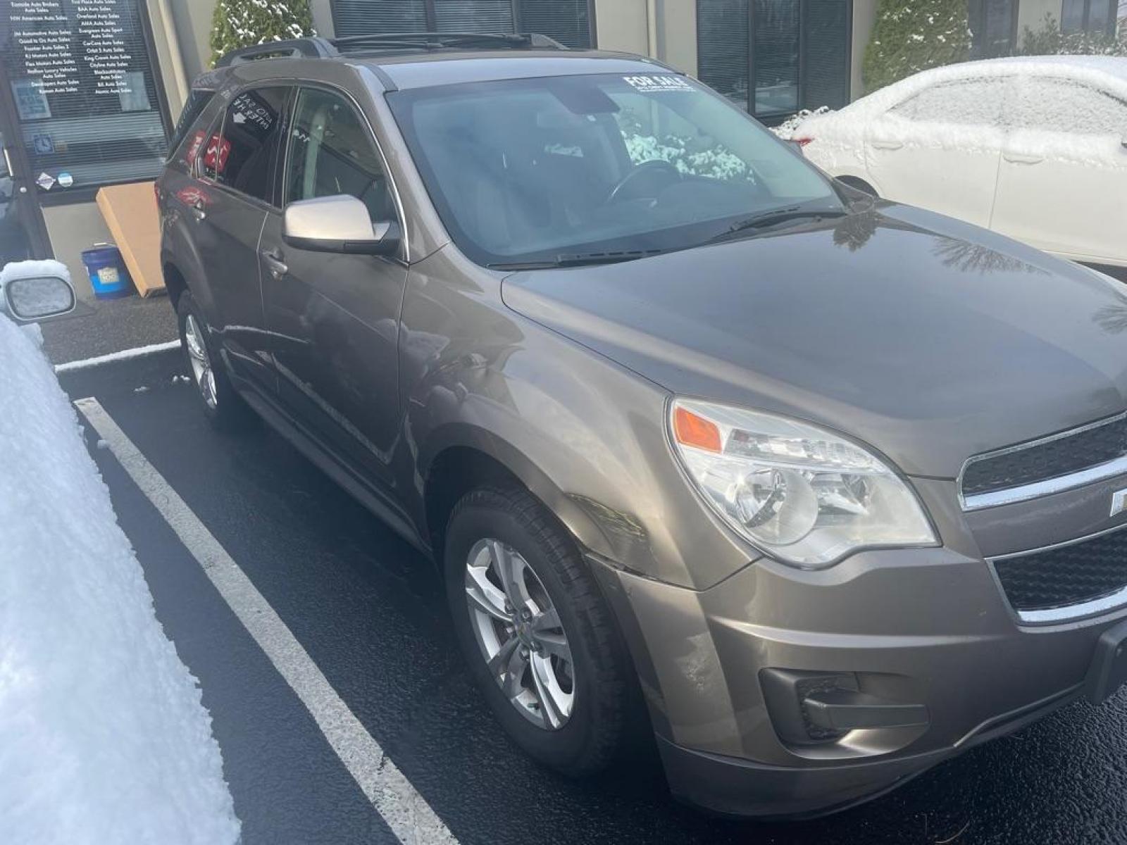 2012 GOLD /BLACK CHEVROLET EQUINOX LT SPRT UTILITY FLEX FUEL (2GNFLEEK2C6) with an 2.4L engine, Automatic transmission, located at 1505 S 356th St., Federal Way, WA, 98003, 47.282051, -122.314781 - This Equinox is a great compact SUV with engaging handling and enough gusto for daily driving, but very good gas mileage with the Flex Fuel package. Very roomy five-seat interior, a user-friendly infotainment system, and a standard list of safety features. It's comfortable to drive on less-than-perf - Photo #1