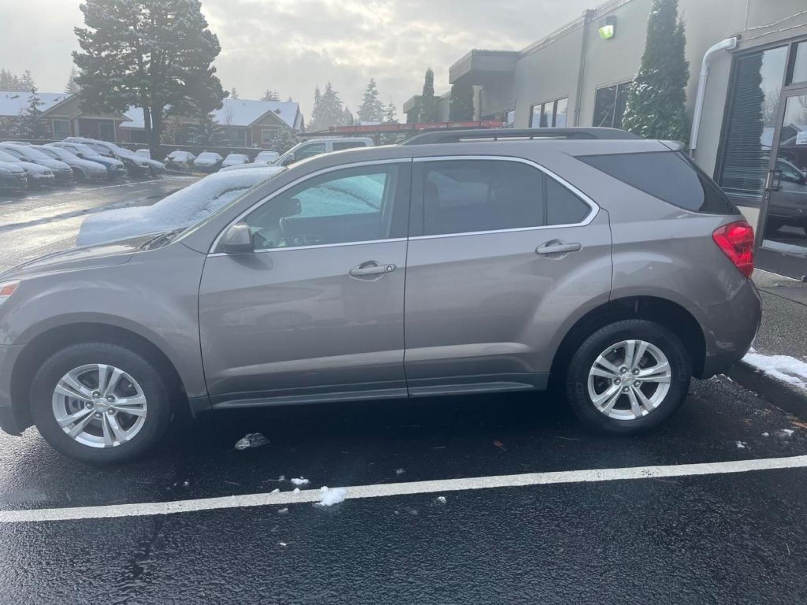 2012 GOLD /BLACK CHEVROLET EQUINOX LT SPRT UTILITY FLEX FUEL (2GNFLEEK2C6) with an 2.4L engine, Automatic transmission, located at 1505 S 356th St., Federal Way, WA, 98003, 47.282051, -122.314781 - This Equinox is a great compact SUV with engaging handling and enough gusto for daily driving, but very good gas mileage with the Flex Fuel package. Very roomy five-seat interior, a user-friendly infotainment system, and a standard list of safety features. It's comfortable to drive on less-than-perf - Photo #3
