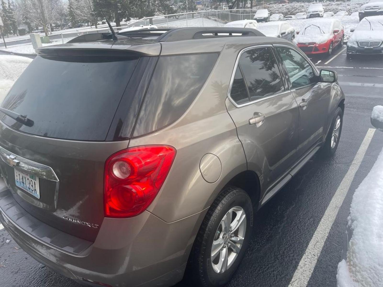 2012 GOLD /BLACK CHEVROLET EQUINOX LT SPRT UTILITY FLEX FUEL (2GNFLEEK2C6) with an 2.4L engine, Automatic transmission, located at 1505 S 356th St., Federal Way, WA, 98003, 47.282051, -122.314781 - This Equinox is a great compact SUV with engaging handling and enough gusto for daily driving, but very good gas mileage with the Flex Fuel package. Very roomy five-seat interior, a user-friendly infotainment system, and a standard list of safety features. It's comfortable to drive on less-than-perf - Photo #4