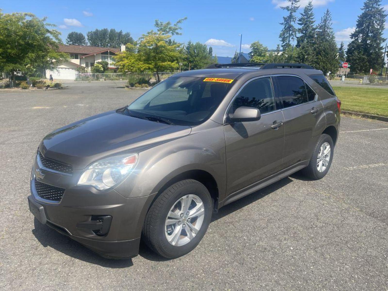 2012 GOLD /BLACK CHEVROLET EQUINOX LT SPRT UTILITY FLEX FUEL (2GNFLEEK2C6) with an 2.4L engine, Automatic transmission, located at 1505 S 356th St., Federal Way, WA, 98003, 47.282051, -122.314781 - Reduced price to $7,999!! Runs great! And will handle wonderful in the rain and PNW weather conditions during fall and winter! This Equinox is a great compact SUV with engaging handling and enough gusto for daily driving, but very good gas mileage with the Flex Fuel package. Very roomy five-sea - Photo #0
