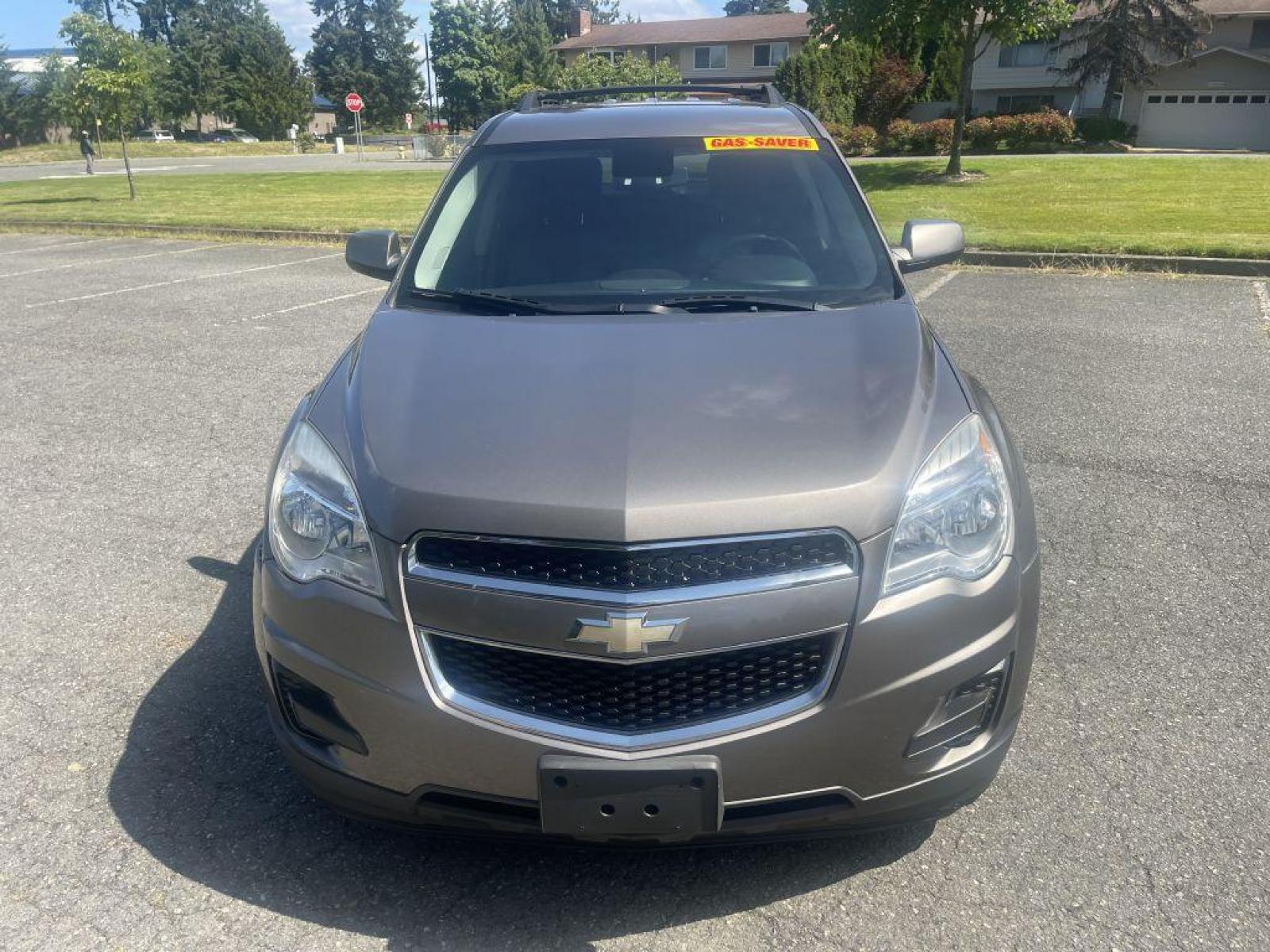 2012 GOLD /BLACK CHEVROLET EQUINOX LT SPRT UTILITY FLEX FUEL (2GNFLEEK2C6) with an 2.4L engine, Automatic transmission, located at 1505 S 356th St., Federal Way, WA, 98003, 47.282051, -122.314781 - Reduced price to $7,999!! Runs great! And will handle wonderful in the rain and PNW weather conditions during fall and winter! This Equinox is a great compact SUV with engaging handling and enough gusto for daily driving, but very good gas mileage with the Flex Fuel package. Very roomy five-sea - Photo #2