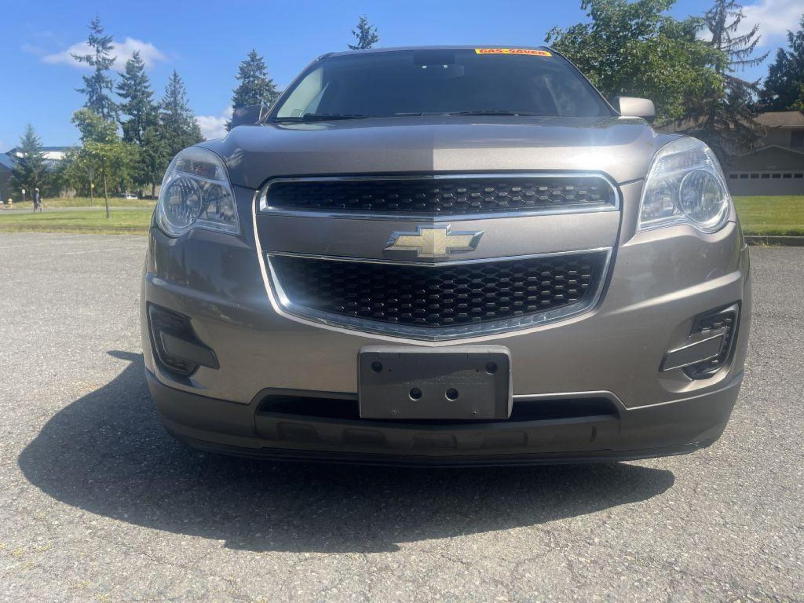 2012 GOLD /BLACK CHEVROLET EQUINOX LT SPRT UTILITY FLEX FUEL (2GNFLEEK2C6) with an 2.4L engine, Automatic transmission, located at 1505 S 356th St., Federal Way, WA, 98003, 47.282051, -122.314781 - Reduced price to $7,999!! Runs great! And will handle wonderful in the rain and PNW weather conditions during fall and winter! This Equinox is a great compact SUV with engaging handling and enough gusto for daily driving, but very good gas mileage with the Flex Fuel package. Very roomy five-sea - Photo #3